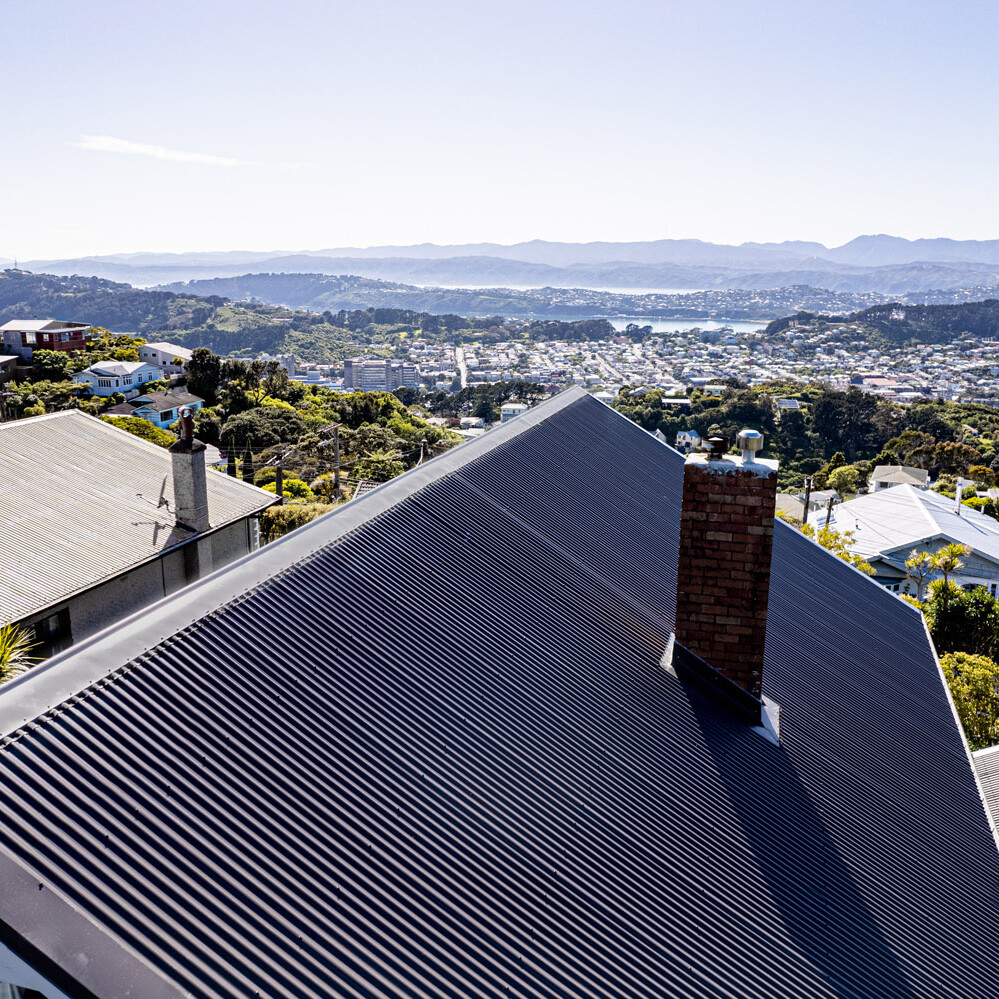Aerial view of a roof and chimney in Brooklyn